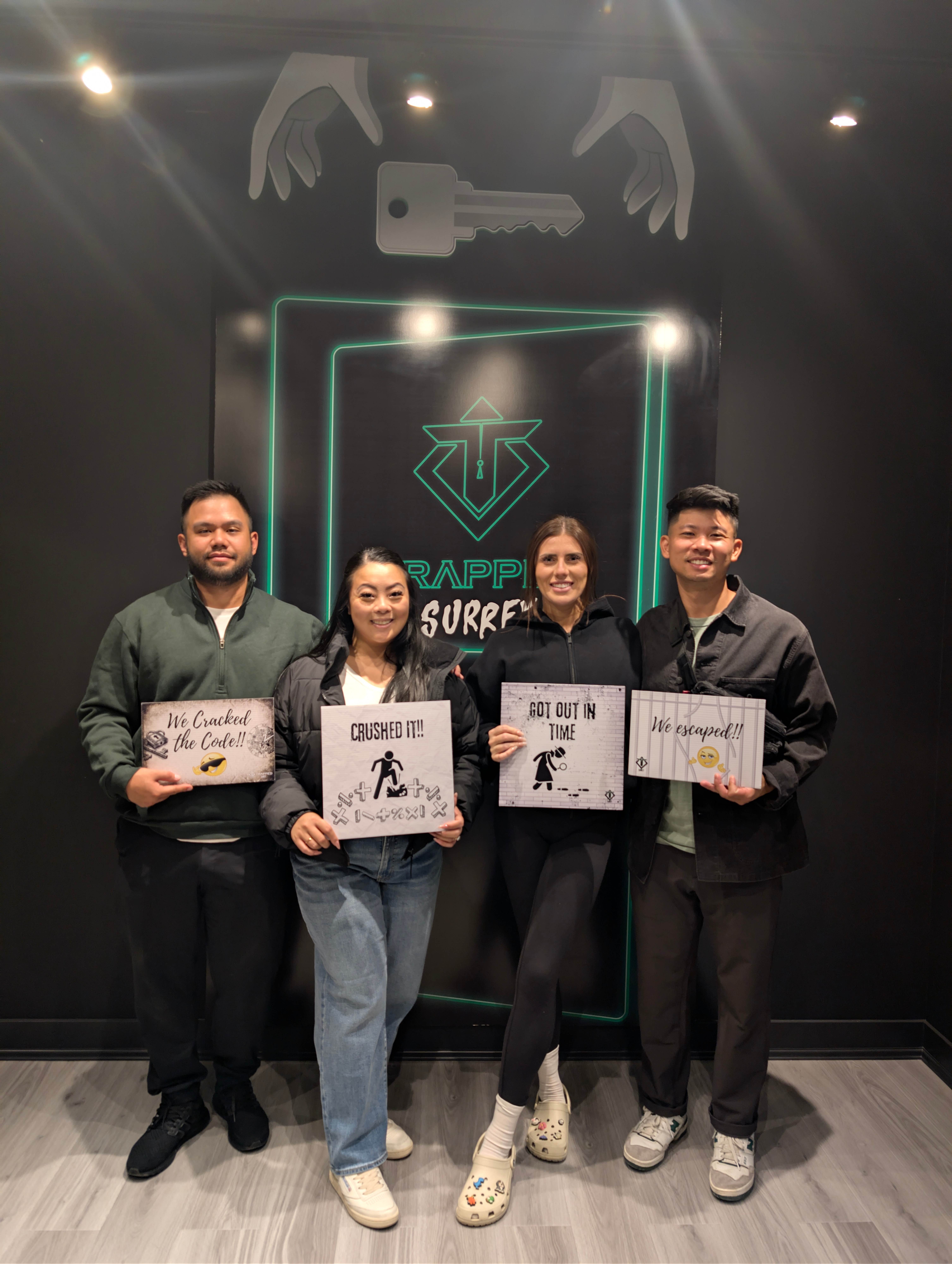 Team celebrating escape room victory